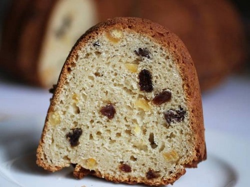 Slice of gluten-free panettone on a dish.