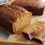 Gluten-Free Pumpkin Bread sliced on cutting board.