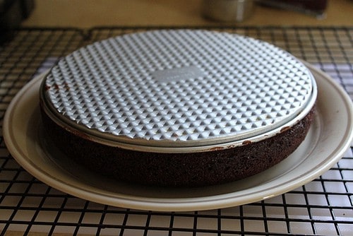 Removing gluten-free brownie from springform pan.