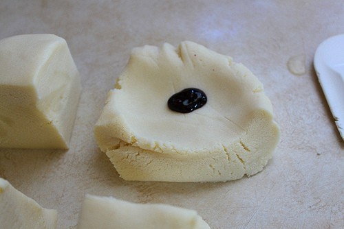 Gluten-free cookie dough with red dye on it.