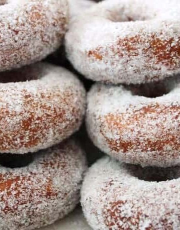 Vegan Apple Cider Doughnuts in a stack.