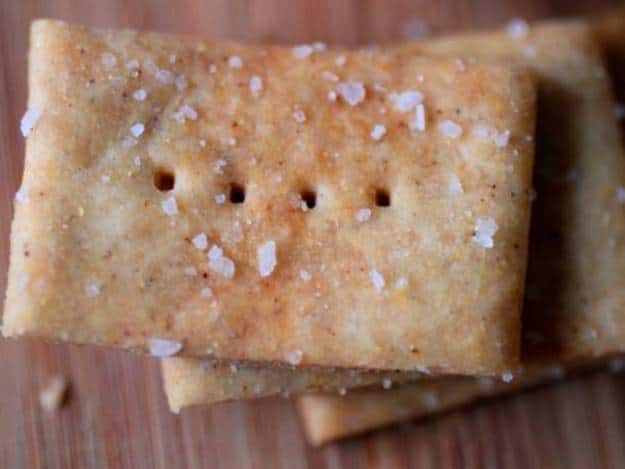 Whole grain gluten-free crackers with salt on top.