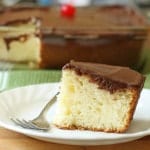 Gluten-Free Yellow Cake slice on white plate.